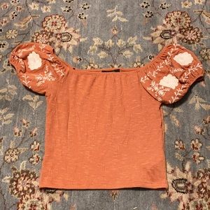 Short sleeve cropped pastel orange shirt